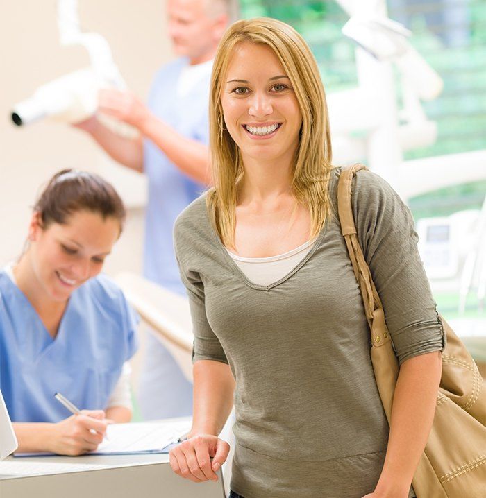 Smiling woman in dental office