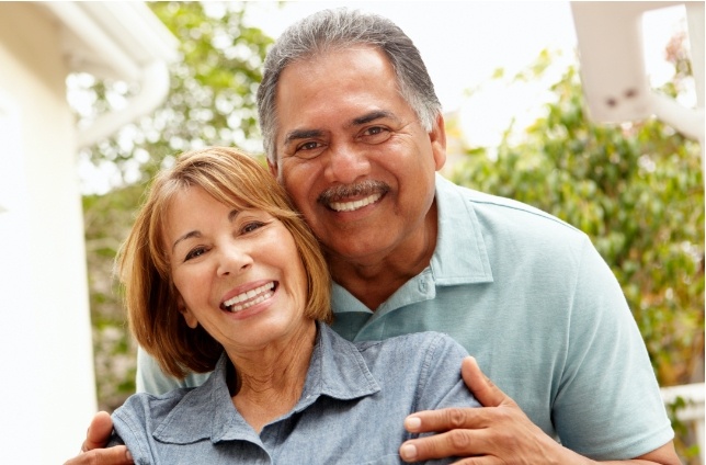 Man and woman sharing healthy smiles