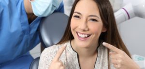 a patient smiling after receiving cosmetic dental bonding